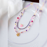 COLLAR TEJIDO PURPURA