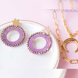 ARETES REDONDOS LILA ESTRELLA